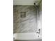 Bright bathroom featuring marble tiled shower and tub at 8770 Sw 196Th Terrace Rd, Dunnellon, FL 34432