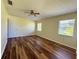 Bright bedroom with neutral paint, wood floors, and natural light at 8770 Sw 196Th Terrace Rd, Dunnellon, FL 34432
