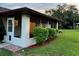 Cozy patio featuring access to the green lawn and a lovely outdoor space at 8770 Sw 196Th Terrace Rd, Dunnellon, FL 34432