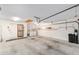 Spacious two-car garage featuring laundry area and abundant storage, ready for your workshop and vehicles at 8885 Sw 90Th Ave, Ocala, FL 34481