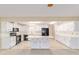 Open-concept kitchen layout featuring an island and modern appliances at 8885 Sw 90Th Ave, Ocala, FL 34481
