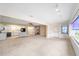 Open-concept living and kitchen area offers a seamless transition and inclusive space at 8885 Sw 90Th Ave, Ocala, FL 34481
