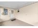 Enclosed back patio offers a private outdoor space with a door to access the backyard at 8885 Sw 90Th Ave, Ocala, FL 34481