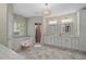 Luxurious bathroom with soaking tub, double vanity, and separate shower at 9175 Se 7Th Avenue Rd, Ocala, FL 34480