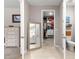 Bathroom view featuring a tiled floor, mirror, closet, toilet, and walk-in closet at 9203 Sw 97Th Cir, Ocala, FL 34481