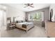 Serene bedroom with plush carpeting, a large window, and a peaceful view at 9203 Sw 97Th Cir, Ocala, FL 34481