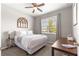 Cozy bedroom featuring a comfortable bed, ample natural light, and tasteful decor at 9203 Sw 97Th Cir, Ocala, FL 34481