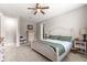 Relaxing bedroom with a large bed, neutral decor, and lots of natural light at 9203 Sw 97Th Cir, Ocala, FL 34481