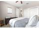Inviting bedroom with a large bed, and closet space, providing a serene retreat at 9203 Sw 97Th Cir, Ocala, FL 34481