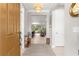 Open foyer with light tile flooring, neutral walls, and a view into the spacious living areas at 9203 Sw 97Th Cir, Ocala, FL 34481