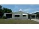 Charming single-story home with awnings and a well-maintained front lawn at 9960 Sw 103Rd Ln, Ocala, FL 34481