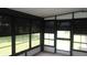 Florida room with screened windows and door at 9960 Sw 103Rd Ln, Ocala, FL 34481