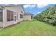 Spacious backyard with lush lawn and partial fencing at 11062 Sw 73Rd Ct, Ocala, FL 34476
