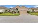 Charming single-Gathering home with a well-manicured lawn, and an attached garage at 11062 Sw 73Rd Ct, Ocala, FL 34476