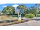 Community sign showcasing Oak Run Country Club with verdant foliage at 11062 Sw 73Rd Ct, Ocala, FL 34476