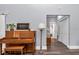 Stylish room featuring hardwood floors, neutral colors, and decor at 12080 Se Sunset Harbor Rd, Weirsdale, FL 32195