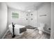 Modern bathroom showcasing a freestanding tub, sleek fixtures, and a tiled walk-in shower at 12690 Ne Highway 315, Fort Mc Coy, FL 32134