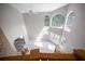 Bright, airy foyer with large arched windows, a ceiling fan, and stylish tile flooring at 12690 Ne Highway 315, Fort Mc Coy, FL 32134