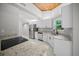 Open kitchen with stainless steel appliances, granite countertops, and a light wood ceiling at 12690 Ne Highway 315, Fort Mc Coy, FL 32134