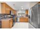 Updated kitchen featuring stainless steel appliances at 1308 La Estrellita Way, The Villages, FL 32162