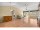 Spacious living room with hardwood floors and ample natural light at 1308 La Estrellita Way, The Villages, FL 32162