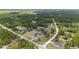 Aerial view of the property highlighting its location in a wooded area at 13663 Sw 66Th St, Ocala, FL 34481