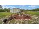 Cozy backyard fire pit provides a great spot for outdoor gatherings at 13663 Sw 66Th St, Ocala, FL 34481