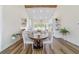 Cozy dining area adjacent to the well-appointed kitchen with a garden view at 13663 Sw 66Th St, Ocala, FL 34481