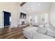 Open-concept living area with a stone fireplace and views to the front entry at 13663 Sw 66Th St, Ocala, FL 34481