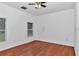 Bright bedroom with hardwood floors and natural light from two windows at 14550 Sw 61St Ct, Ocala, FL 34473