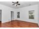 Bright bedroom with hardwood floors, ceiling fan, closet, and natural light at 14550 Sw 61St Ct, Ocala, FL 34473