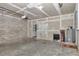 Spacious unfinished garage leading to laundry room, water heater and exterior access at 14550 Sw 61St Ct, Ocala, FL 34473