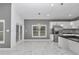 Modern kitchen with stainless steel appliances and marble floors at 14550 Sw 61St Ct, Ocala, FL 34473