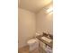 Powder room featuring single sink with decorative countertop and silver fixtures at 1610 Se 22Nd Ave, Ocala, FL 34471
