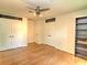 Spacious bedroom with wood flooring, double closets, and ample natural light at 1610 Se 22Nd Ave, Ocala, FL 34471