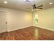 Bright bedroom featuring wood-look floors, ceiling fan, recessed lighting, and natural light from the window at 1610 Se 22Nd Ave, Ocala, FL 34471