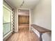 Entryway with wood floors, console table, and decorative drapes at 1610 Se 22Nd Ave, Ocala, FL 34471