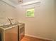 Laundry room with modern washer and dryer at 1610 Se 22Nd Ave, Ocala, FL 34471