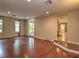 Bright living room boasts hardwood floors and recessed lighting at 1610 Se 22Nd Ave, Ocala, FL 34471