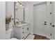 Well-lit bathroom with a stylish vanity, modern fixtures, and a minimalist aesthetic at 1631 W Hwy 329, Citra, FL 32113