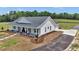 Beautiful single-story home boasting a well-manicured front yard and charming front porch at 1631 W Hwy 329, Citra, FL 32113