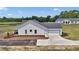 Charming single-story home featuring a garage and well-maintained landscaping at 1631 W Hwy 329, Citra, FL 32113