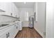 Well-equipped laundry room with modern appliances, functional storage, and a clean aesthetic at 1631 W Hwy 329, Citra, FL 32113