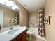 Bathroom features a vanity with white countertop and a shower with tub at 16405 Sw 14Th Avenue Rd, Ocala, FL 34473