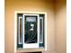 This home has an ornate security door with storm door, sidelights, and a transom window at 16405 Sw 14Th Avenue Rd, Ocala, FL 34473