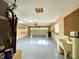 Spacious garage with epoxy floors and an electric garage door at 16405 Sw 14Th Avenue Rd, Ocala, FL 34473