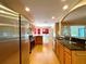 Modern kitchen features stainless steel appliances, wooden cabinets, and a breakfast bar area at 16405 Sw 14Th Avenue Rd, Ocala, FL 34473