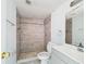 Updated bathroom with walk-in shower and modern vanity sink at 1801 Caralee Blvd # 2, Orlando, FL 32822