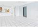 Spacious living area with tile flooring, plenty of space for furniture and kitchen bar area at 1801 Caralee Blvd # 2, Orlando, FL 32822
