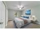 Bright bedroom with neutral decor, plush bedding, and a cozy atmosphere at 19028 Sw 101 Pl, Dunnellon, FL 34432